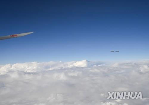 시진핑 전용기 에스코트하는 사우디 전투기들 (신화=연합뉴스)