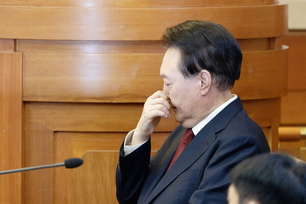 윤석열 대통령이 21일 오후 서울 종로구 헌법재판소에서 열린 탄핵심판 3차 변론에 출석하고 있다. 2025.1.21 [사진공동취재단] 연합뉴스
